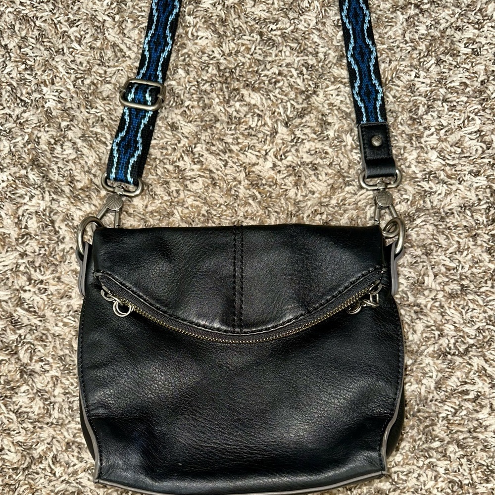 The Sak Soft Black Textured Leather Crossbody w/ Blue/Black Woven Strap